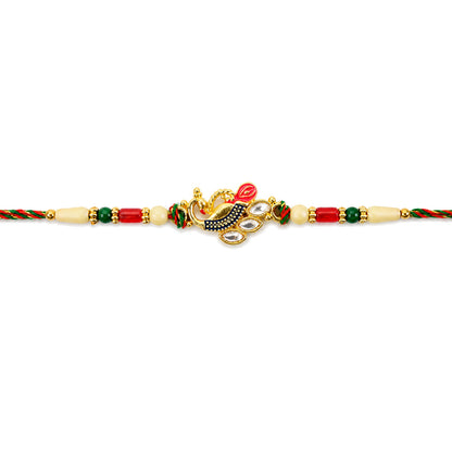 Diamond Shaped Kundan Pendant Rakhi with Peacock Feather Accent