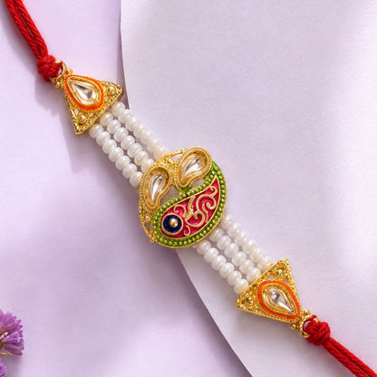 Pearl Paisley Rakhi with Red Thread and Golden Festive Brother Gift Presentation
