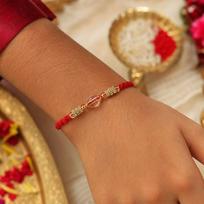 Red Twisted Cord Rakhi with Crystal Bead and Golden Accents