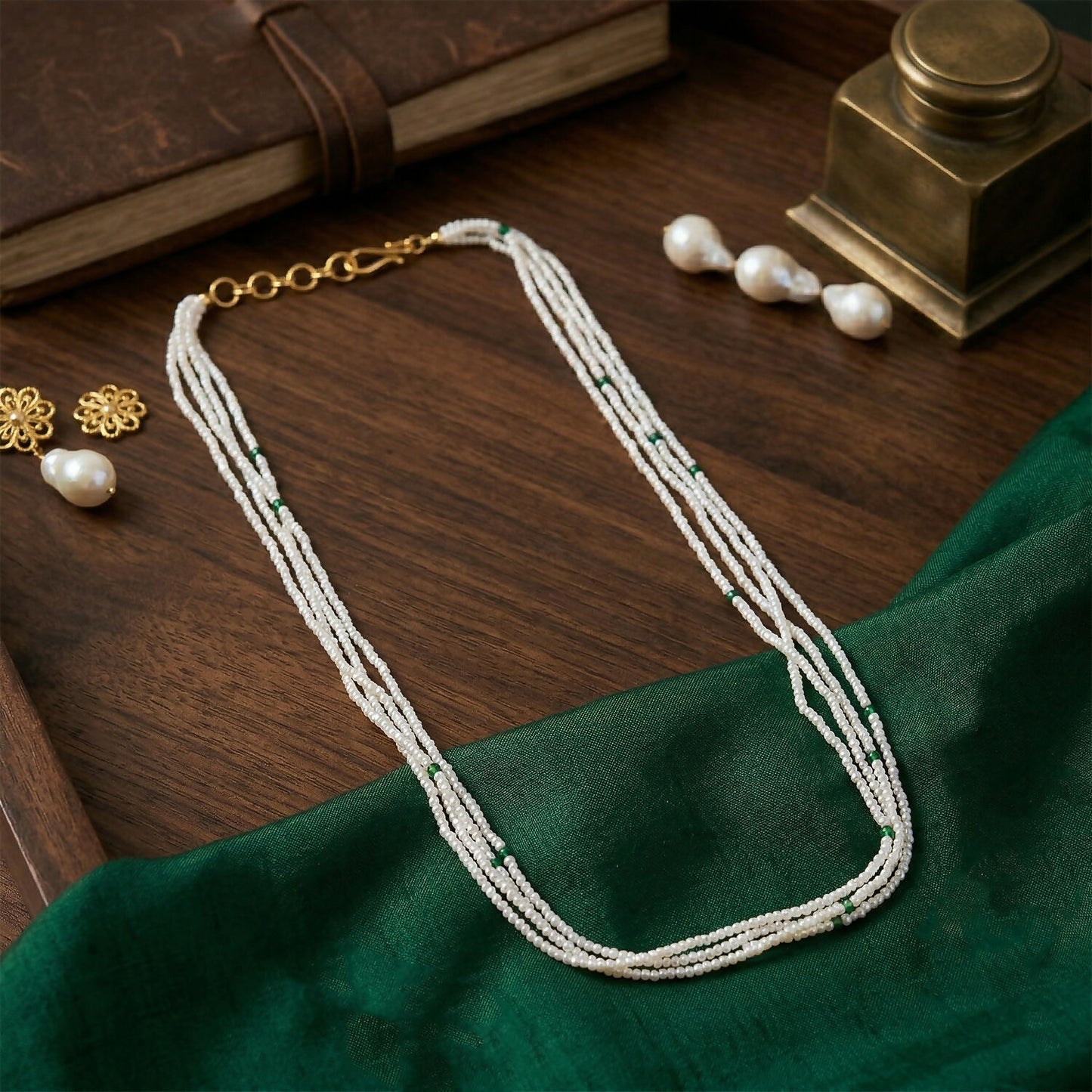 Elegant layered mala with white beads and green highlights