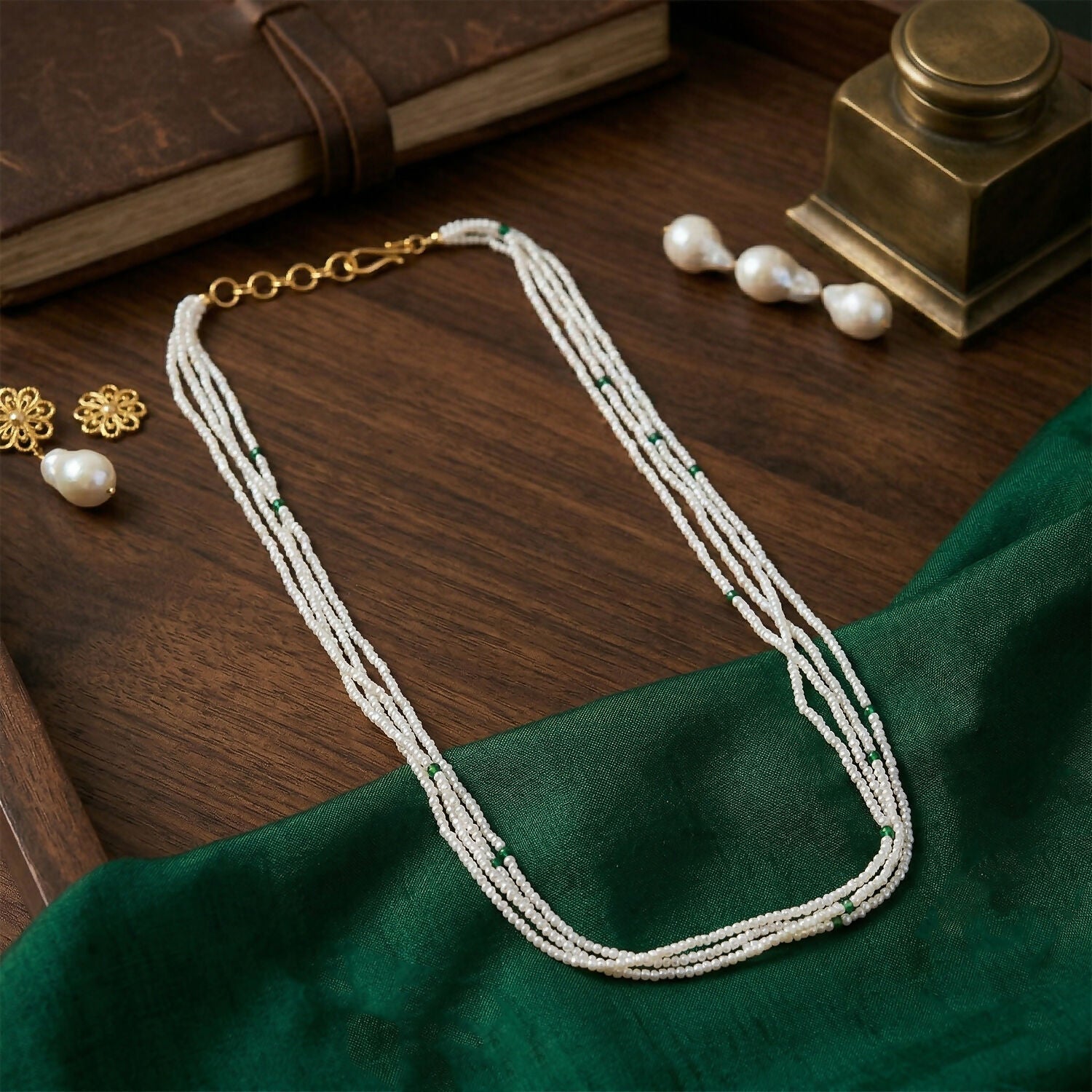 Elegant layered mala with white beads and green highlights
