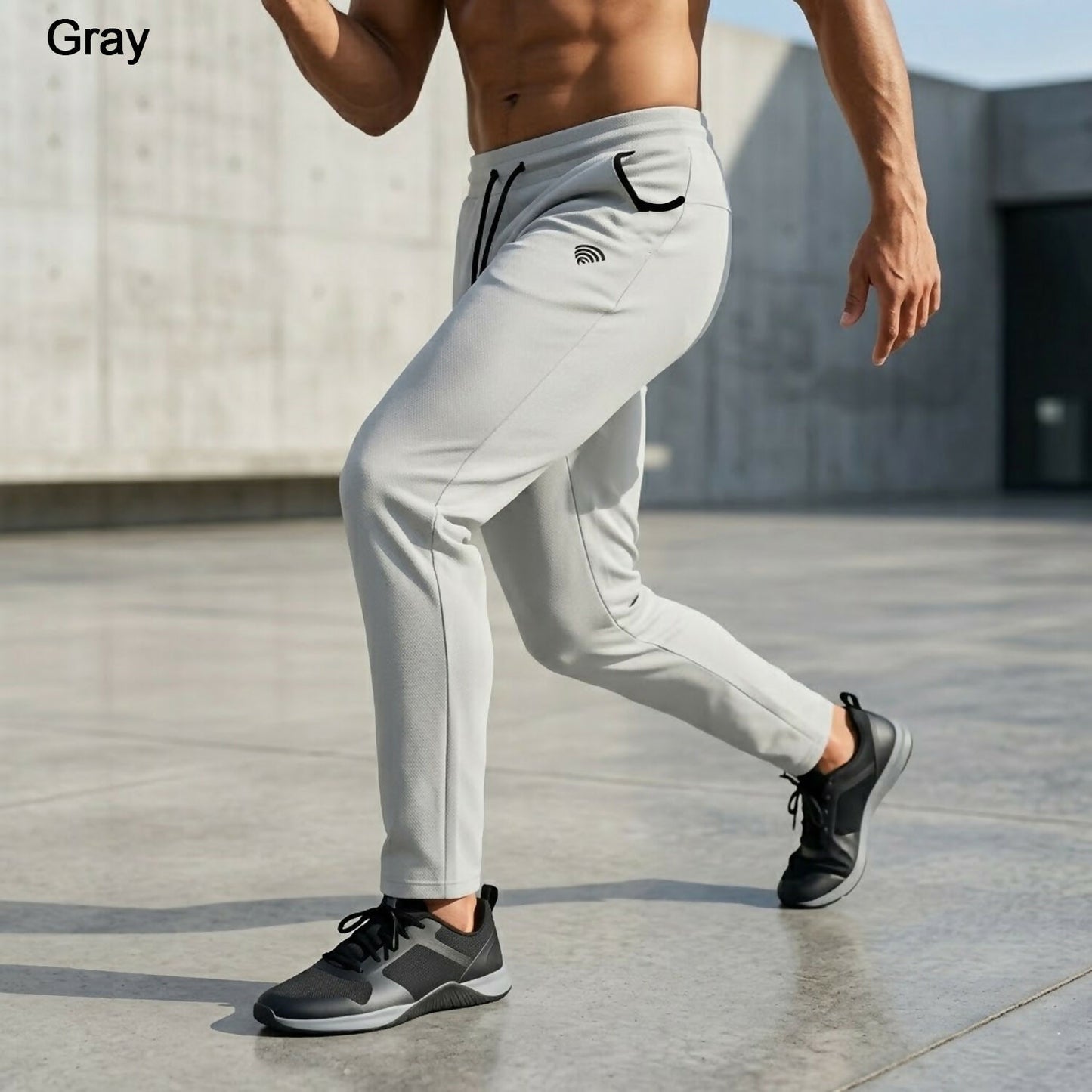 Men's versatile 4-way stretch track pants in grey, sporty design