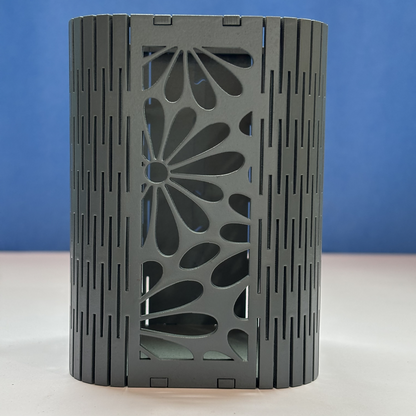 The Floral Mesh Pen Holder adding a decorative touch to a modern workspace.