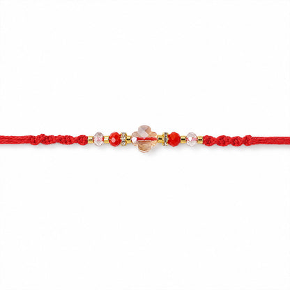 Red Thread Rakhi with a Row of Sparkling Crystal Bead Pendant Accents