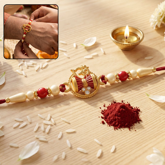 Golden Damru Om Rakhi with red and white beads close-up
