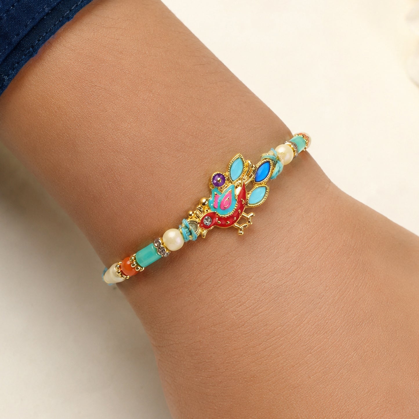 Colorful Enamel Peacock Pendant Rakhi with Multicolor Beads