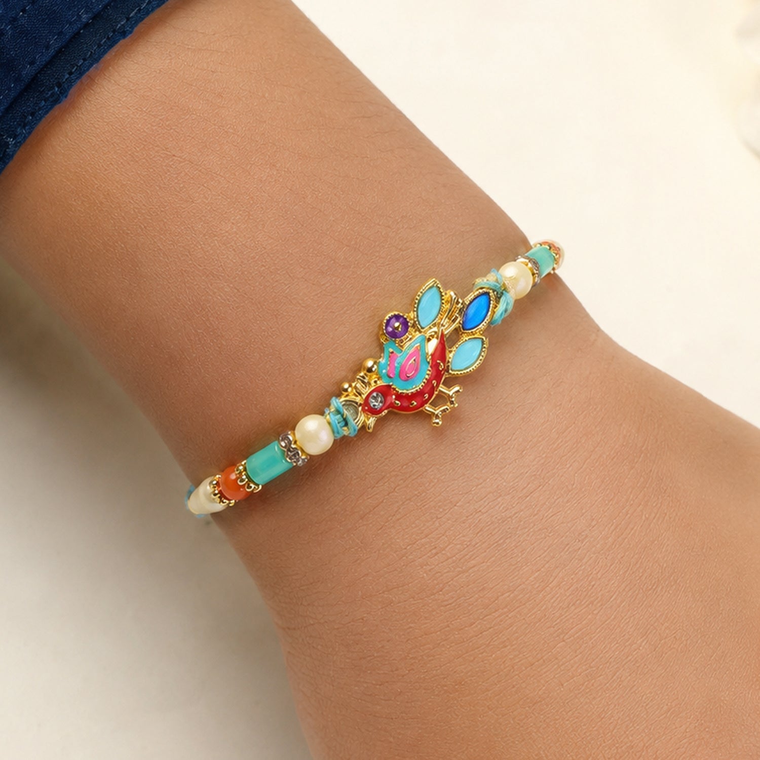Colorful Enamel Peacock Pendant Rakhi with Multicolor Beads