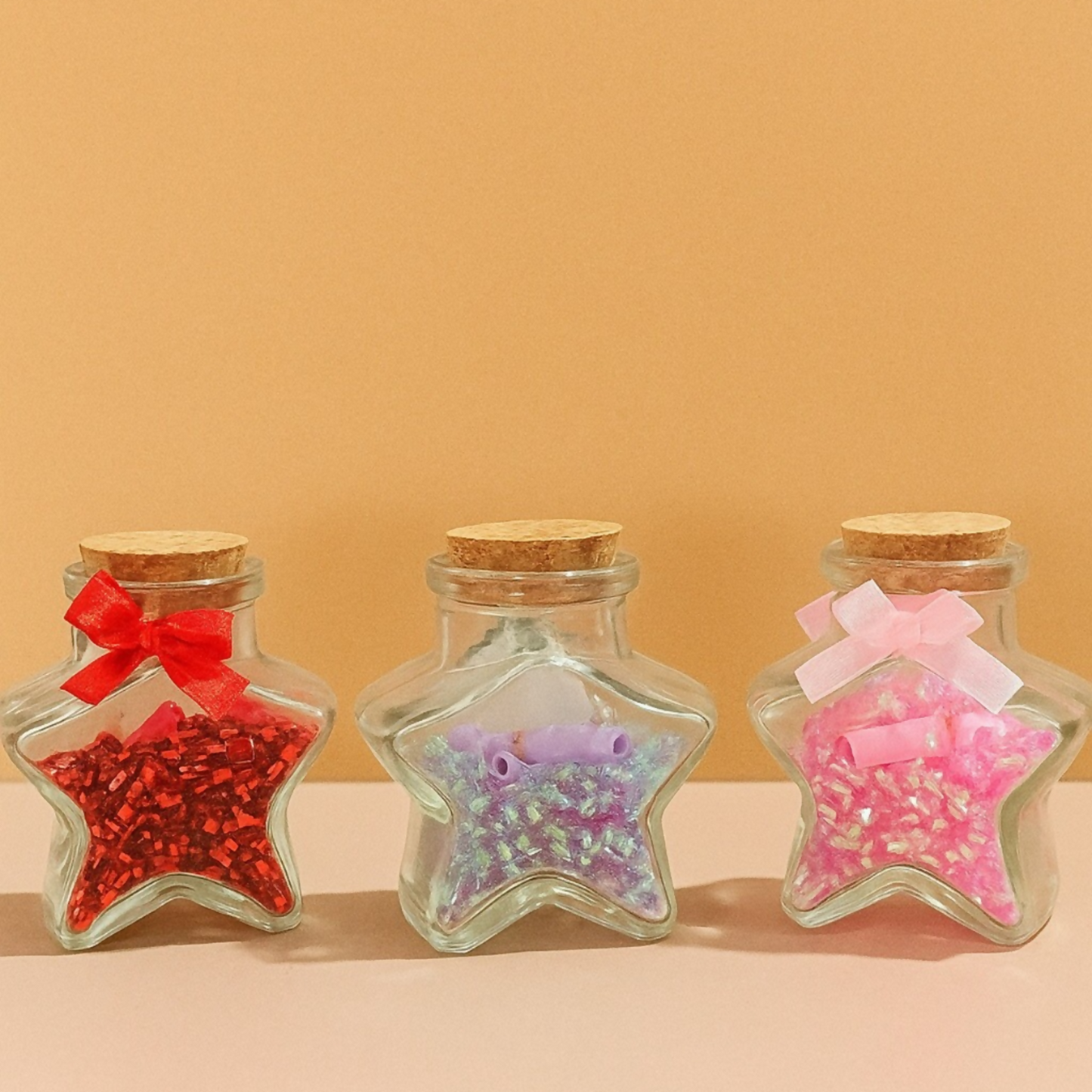 Star Shaped Glass Love Jar Bottles with Cork Lid and Decorative Ribbon – Set of 3 (Red, Blue & Pink) | Cute Romantic Gift Bottles for Valentine’s Day, Anniversary, Birthday, Home Decor | Glitter Filled Mini Message Bottles