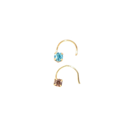 Gold plated pink crystal nose pin showcasing delicate sparkle and shine