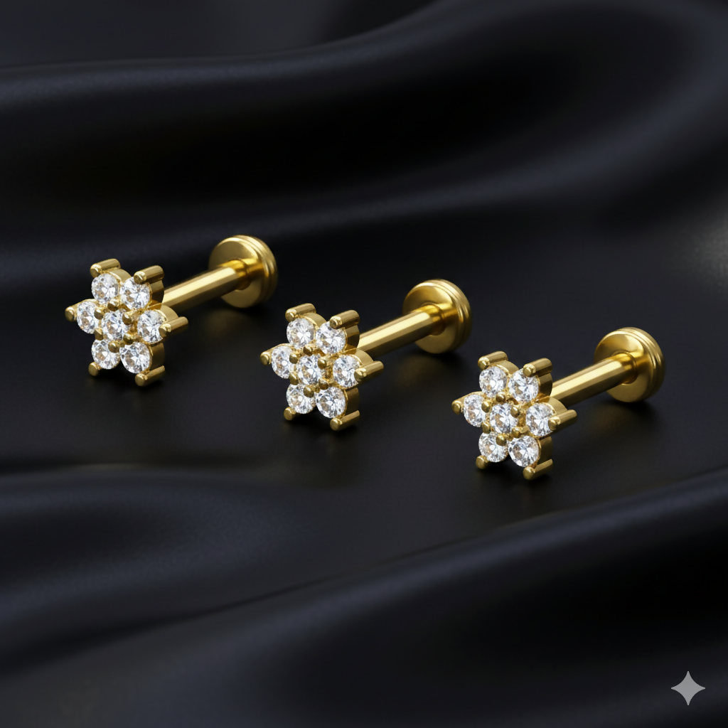 Close-up of shimmering gold plated flat back flower nosepin stud crystals