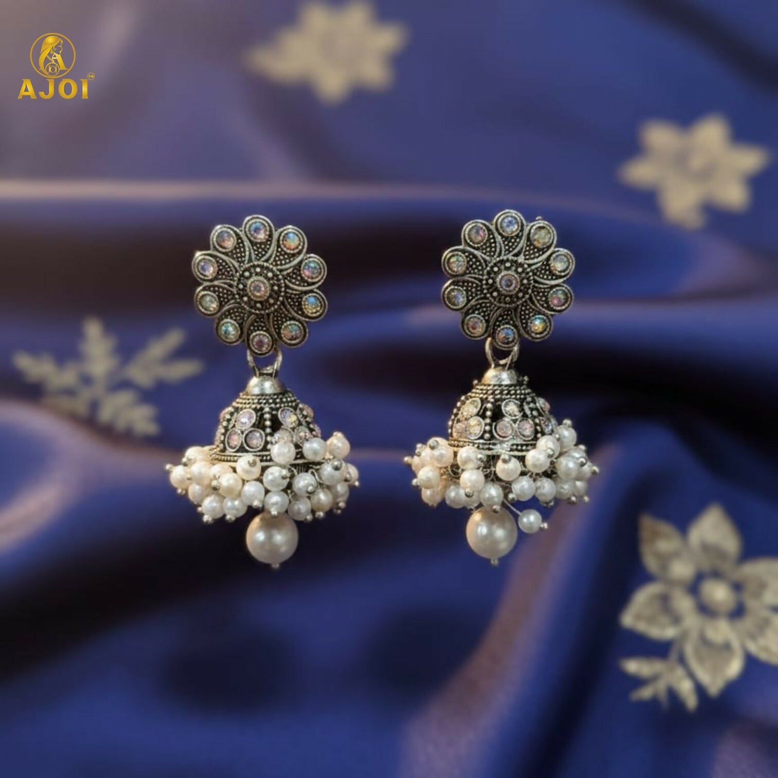 Oxidised silver jhumka earrings styled with traditional Indian attire