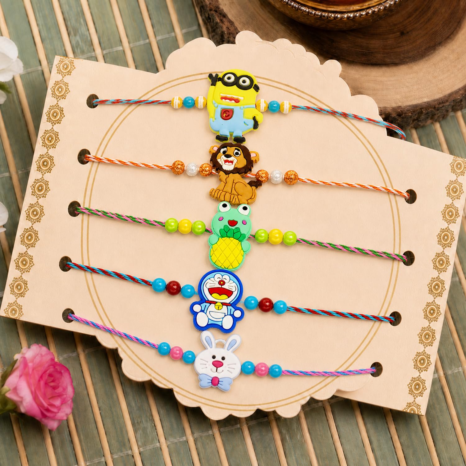 Trendy Charming Rakhi for Brother with Roli Tikka, Pooja Coin & Card, Pack of 8