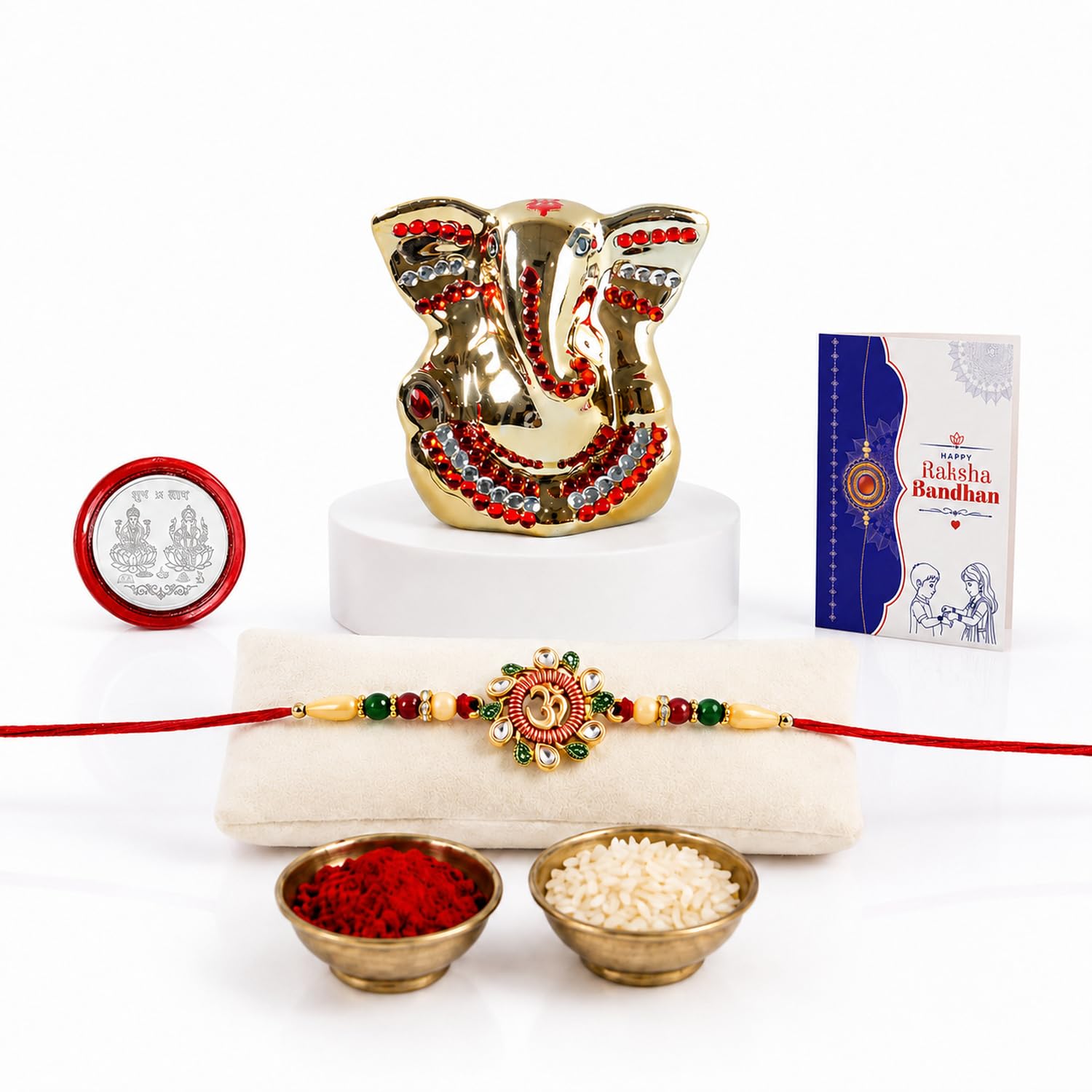 Rakhi for Brother – Ganesh Idol Beautiful Rakhi with Silver Color Pooja Coin