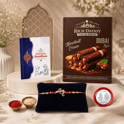 Ganesha charm Multicolor Rakhi – Hazelnut Cream Wafer Roll Gift Combo (Pack of 5) For Raksha Bandhan