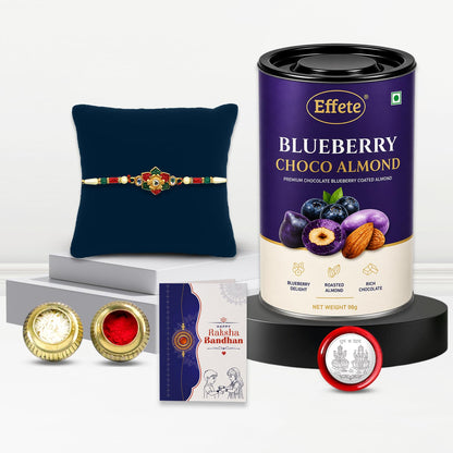 Rakhi with Chocolate for Brother – Raksha Bandhan Combo with Colorful Flower Rakhi, Chocolate, Roli Chawal, Silver Color Coin & Greeting Card – Traditional Festival Celebration (Set of 5)