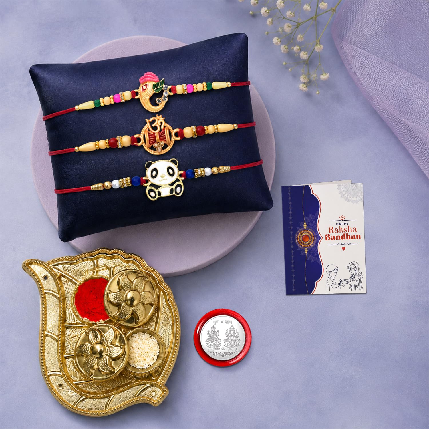 Ganesha Rakhi for Brother with Pooja Thali, Roli Tikka & Card | Pack of 7