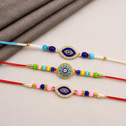Designer Ethnic Multicolor Evil Eye Rakhi for Brother with Roli Tikka, Pack of 6