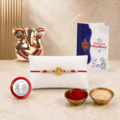 Rakhi for Brother – Ganesh Idol Beautiful Rakhi with Silver Color Pooja Coin