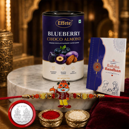 Rakhi with Chocolate for Brother – Raksha Bandhan Combo with Cartoon Character Rakhi, Chocolate, Roli Chawal, Silver Color Coin & Greeting Card – Traditional Festival Celebration (Set of 5)