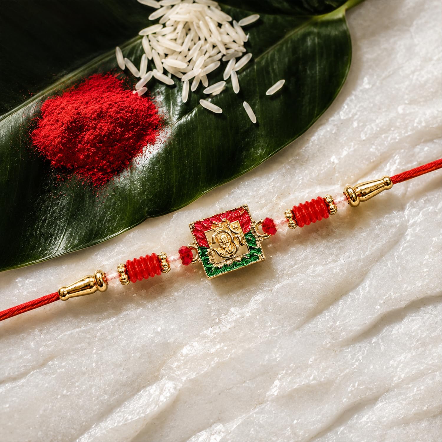 Deity Rakhi for Brother with Pistachio Wafer Rolls, Roli Tikka & Card, Pack of 5