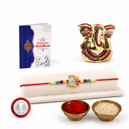 Rakhi for Brother – Ganesh Idol Beautiful Rakhi with Silver Color Pooja Coin