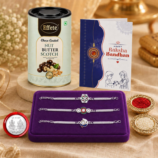 A Raksha Bandhan gift set features a tall tin of Nut Butter Scotch, a greeting card, three silver bracelets on a purple