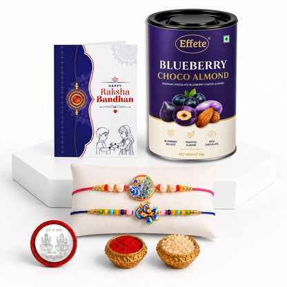 Rakhi Set for Brother (Set of 6) – Peacock & Round Shape Rakhi Combo with Chocolate, Roli Chawal, Silver Color Pooja Coin & Greeting Card – Raksha Bandhan Gift Hamper (K2_1020+1051_BA96)