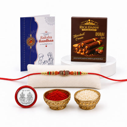 Trinetra Rakhi for Brother with Hazelnut Wafer Rolls, Coin & Card, Pack of 5