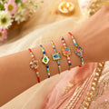 Elegant Beautiful Rakhi for Brother with Roli Tikka, Pooja Coin & Card, Pack of 8