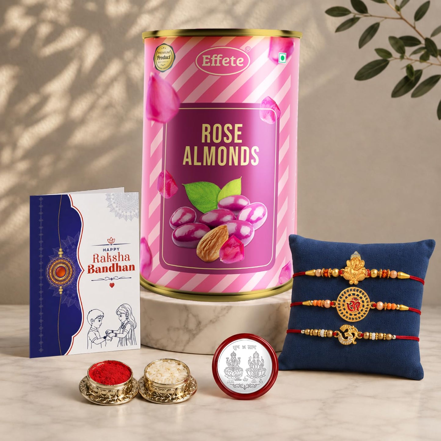 Ganesha, OM Rakhi for Brother with Rose Almond 96gm, Roli Tikka & Card, Pack of 7
