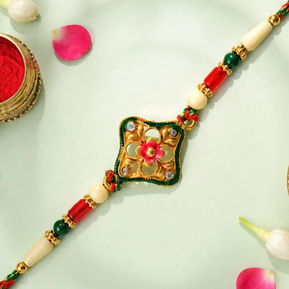 Green Enamel Kite Shaped Pendant Rakhi with Red Flower Center