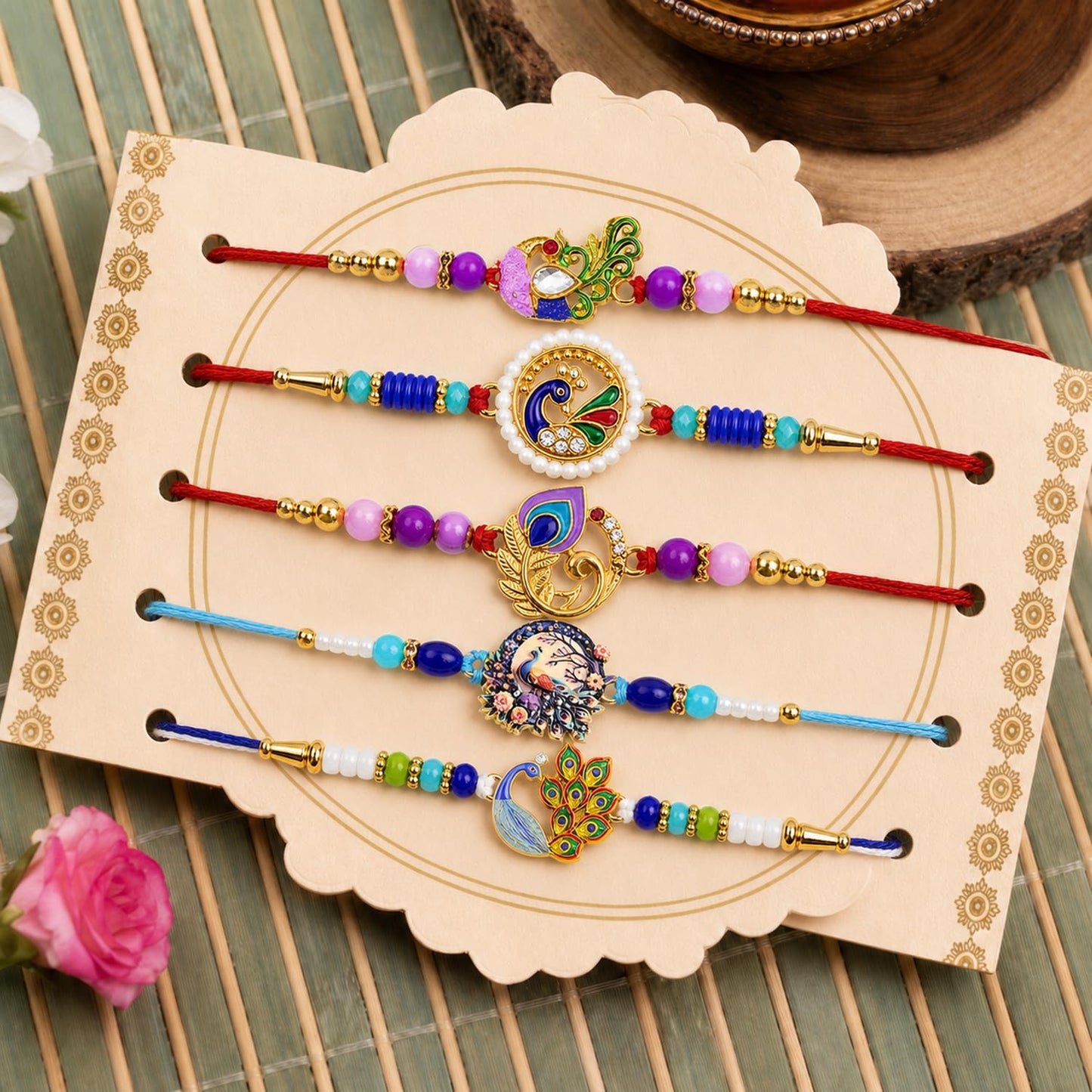 Stylish Auspicious Rakhi for Brother with Roli Tikka & Greeting Card, Pack of 8