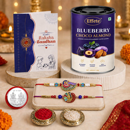 Rakhi with Chocolate for Brother (Set of 6) – Raksha Bandhan Festival Celebration Combo with Multicolor Peacock Design Rakhi 2 Pc, Chocolate, Roli Chawal, Silver Color Coin & Greeting Card