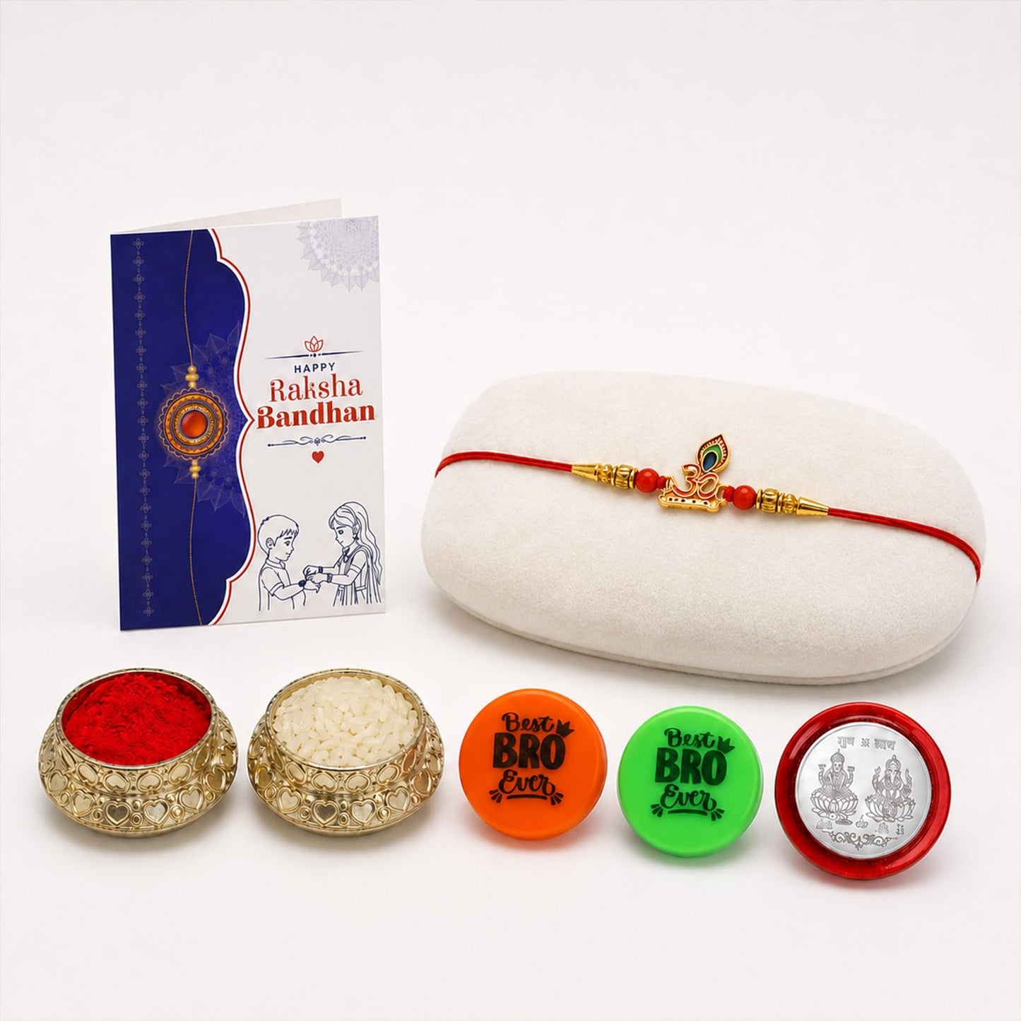Rakhi Set for Brother (Set of 1) – Om Design Rakhi Combo with Roli Chawal, Silver Color Pooja Coin, Multicolour Magnets and Greeting Card – Traditional Raksha Bandhan Gift Hamper for Bhai