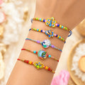 Elegant Vibrant Rakhi for Brother with Roli Tikka, Pooja Coin & Card, Pack of 8
