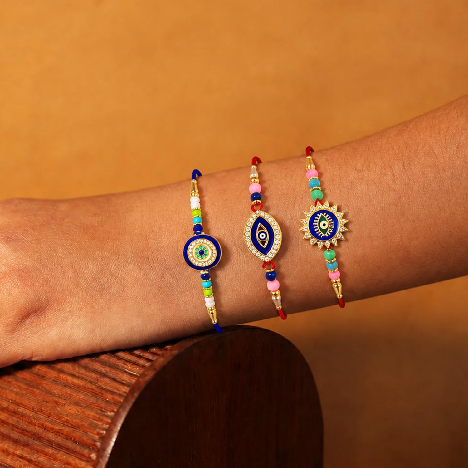Designer Stylish Multicolor Evil Eye Rakhi for Brother with Roli Tikka, Pack of 6