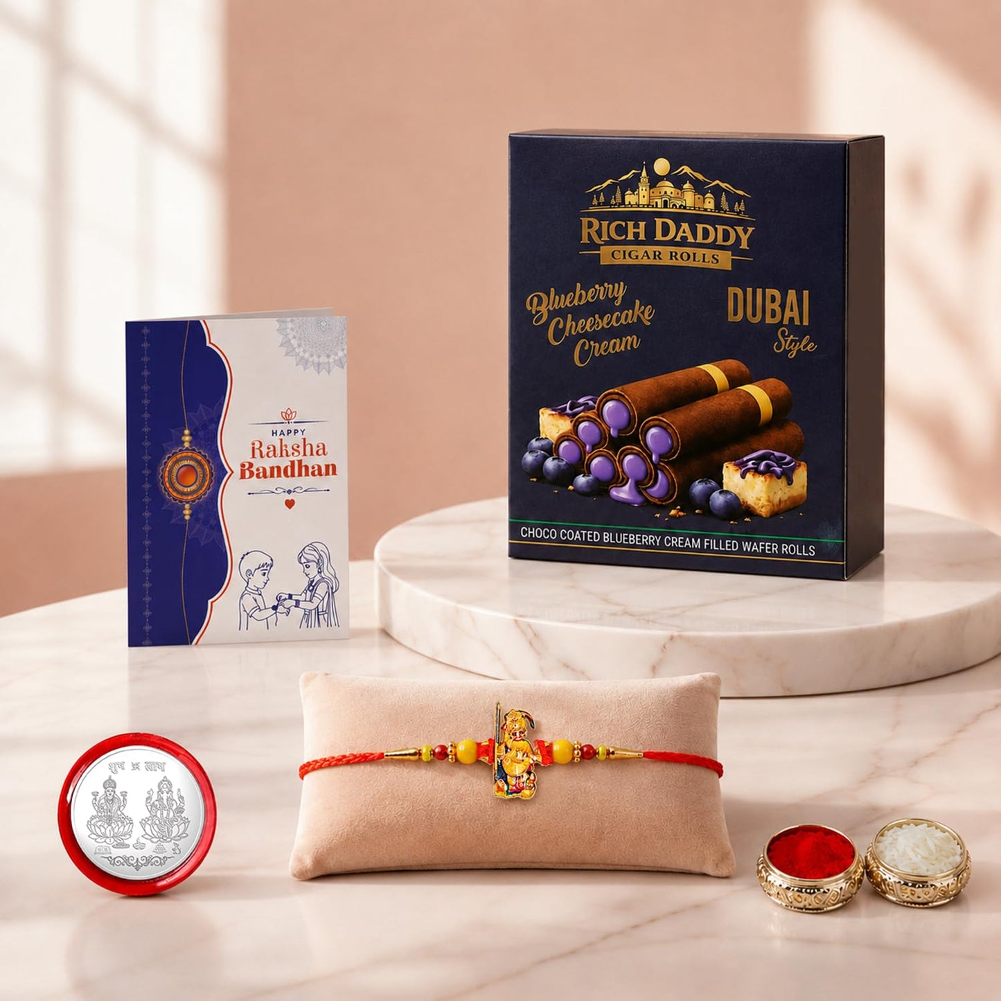 Ganesha Rakhi for Brother with Blueberry Wafer Rolls, Coin & Card, Pack of 5