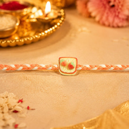 Clay Rakhi for Brother with Butter Scotch 32gm, Roli Tikka & Card, Pack of 7