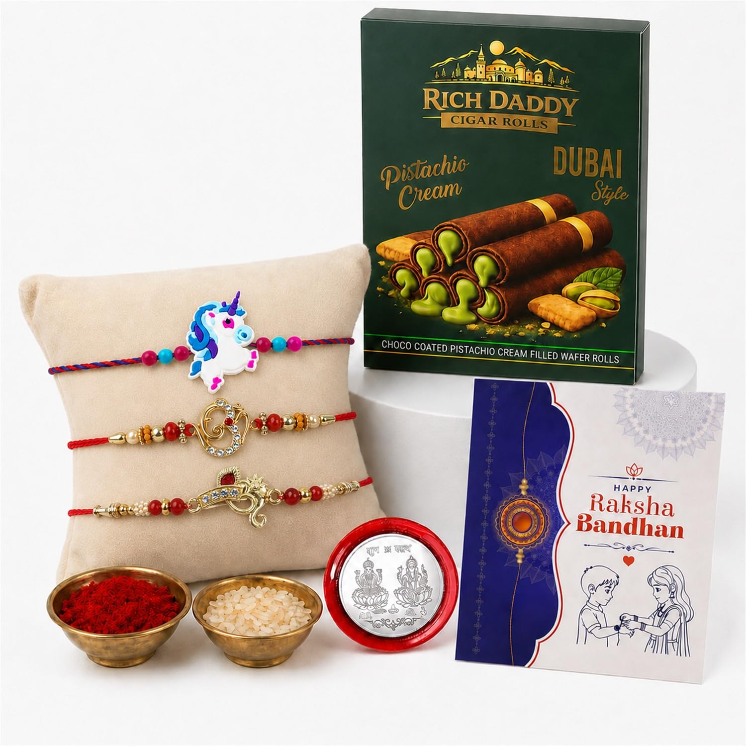 Ganesha Rakhi for Brother with Pistachio Wafer Rolls, Coin & Card, Pack of 7