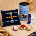 Raksha Bandhan Gift Combo – Ganesha Peacock Rakhi & Chocolates