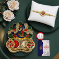Raksha Bandhan Combo Gift Set with Floral Bracelet Rakhi and Peacock Thali