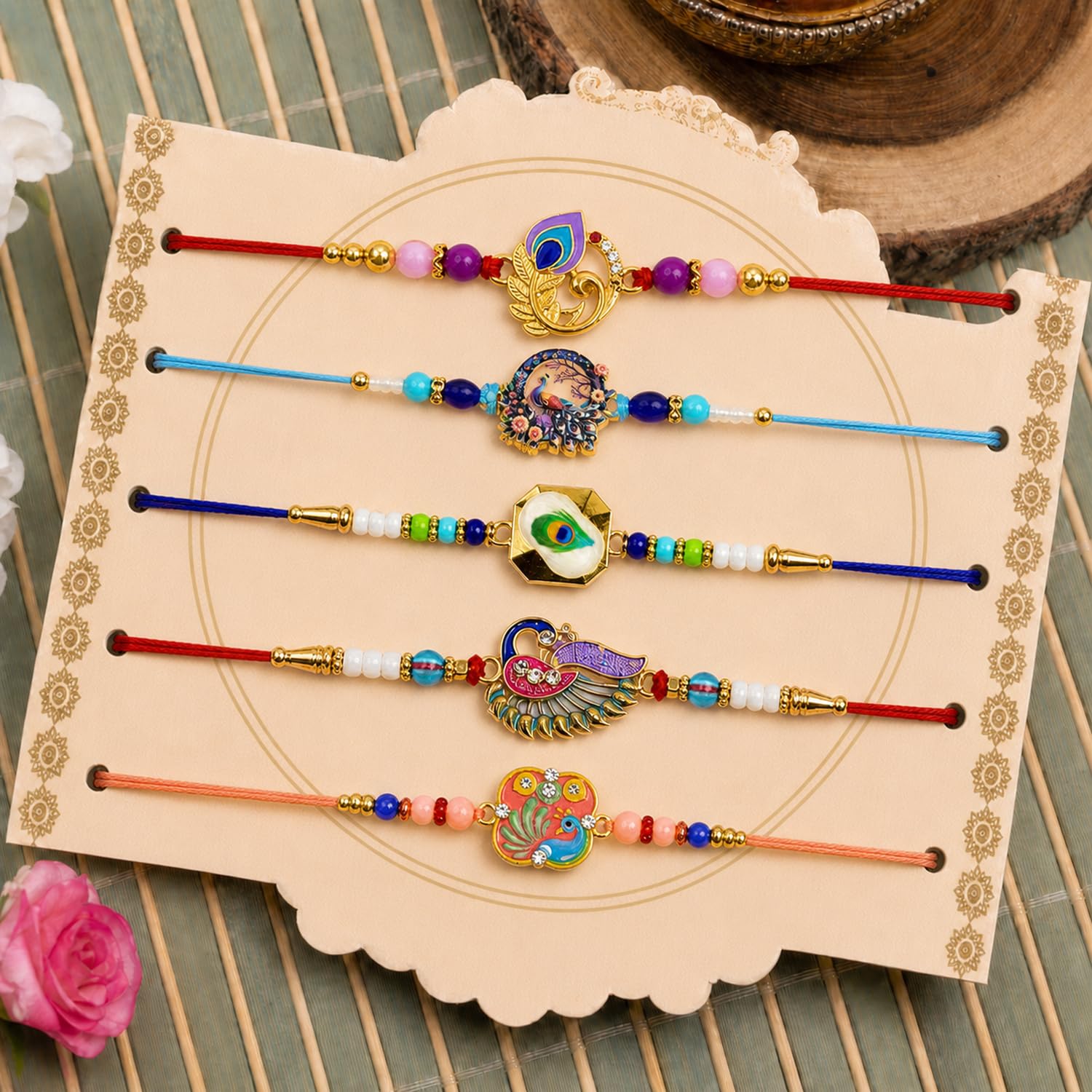 Elegant Artistic Rakhi for Brother with Roli Tikka, Pooja Coin & Card, Pack of 8