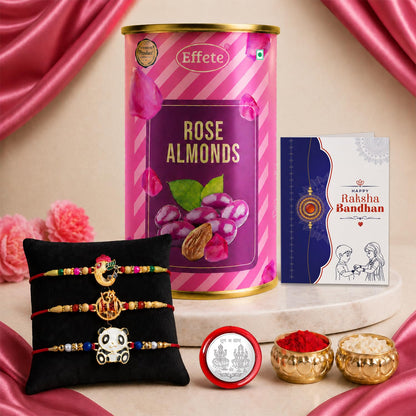 A pink and purple tin of rose almonds, a greeting card, three colorful bracelets on a black cushion, a silver coin, and two