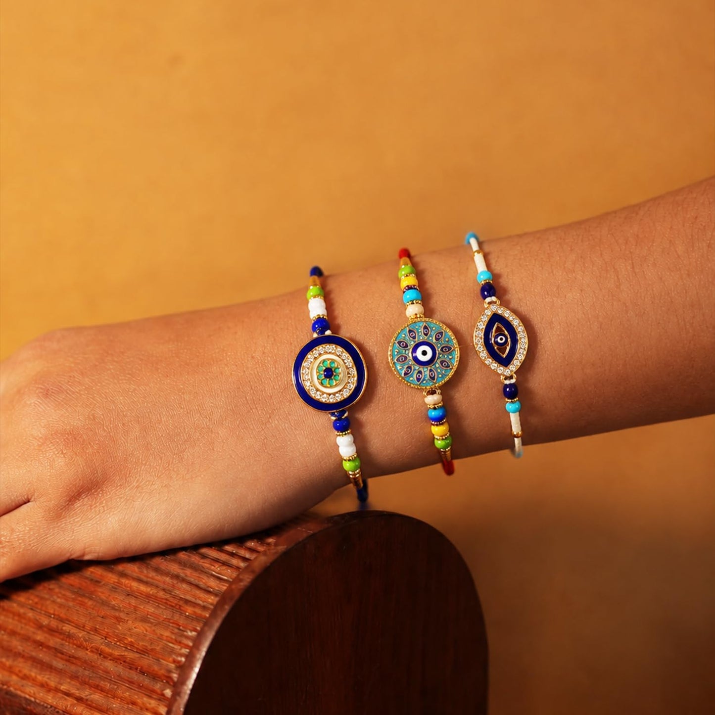 Designer Elegant Multicolor Evil Eye Rakhi for Brother with Roli Tikka, Pack of 6