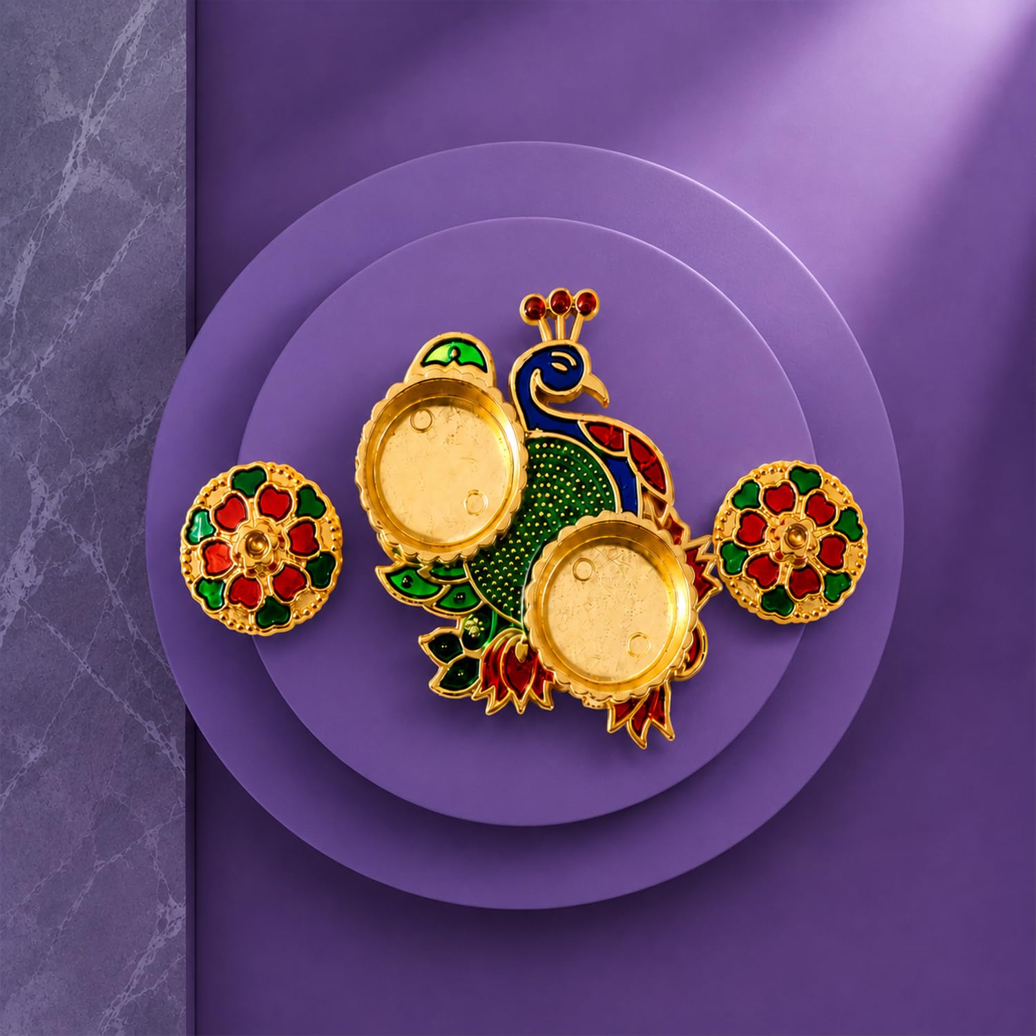 Peacock shape pooja thali with a silver colour coin and tilak set.