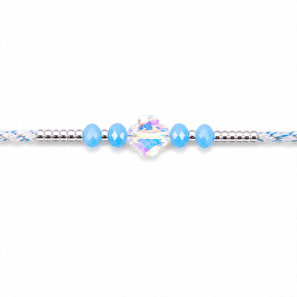 Blue Crystal Bead Rakhi with Round Stone Centre, Silver Highlights and Red Thread