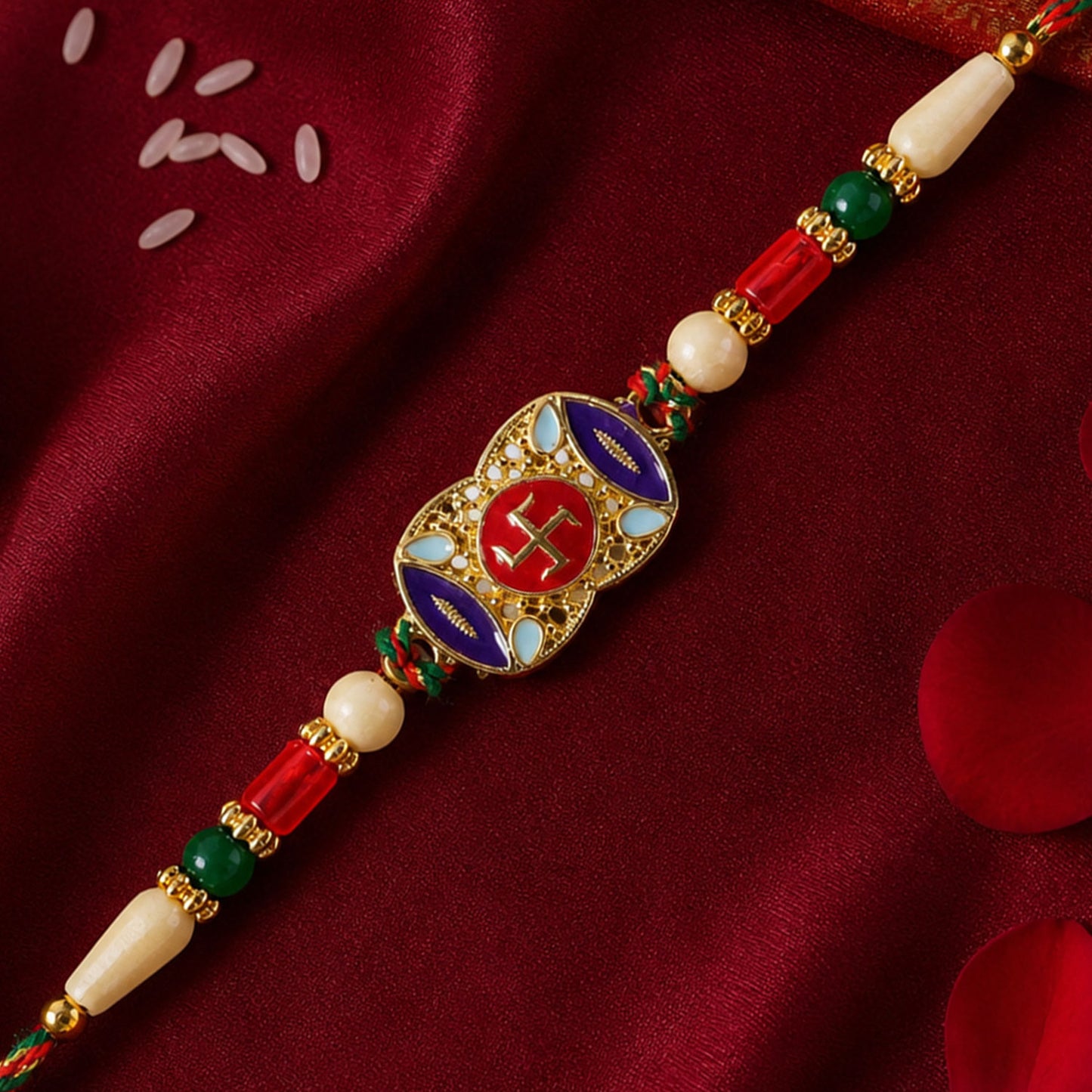 Festive Rakhi featuring Swastik Medallion and gold trims in display look for Gift Use