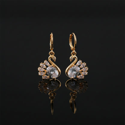 Stylish swan motif drop earrings featuring sparkling clear stones and hanging style