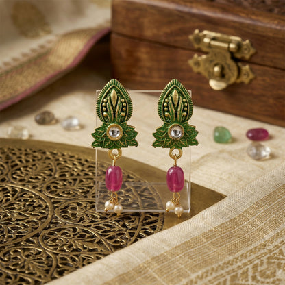 Close-up of green beads and detailed centerpiece