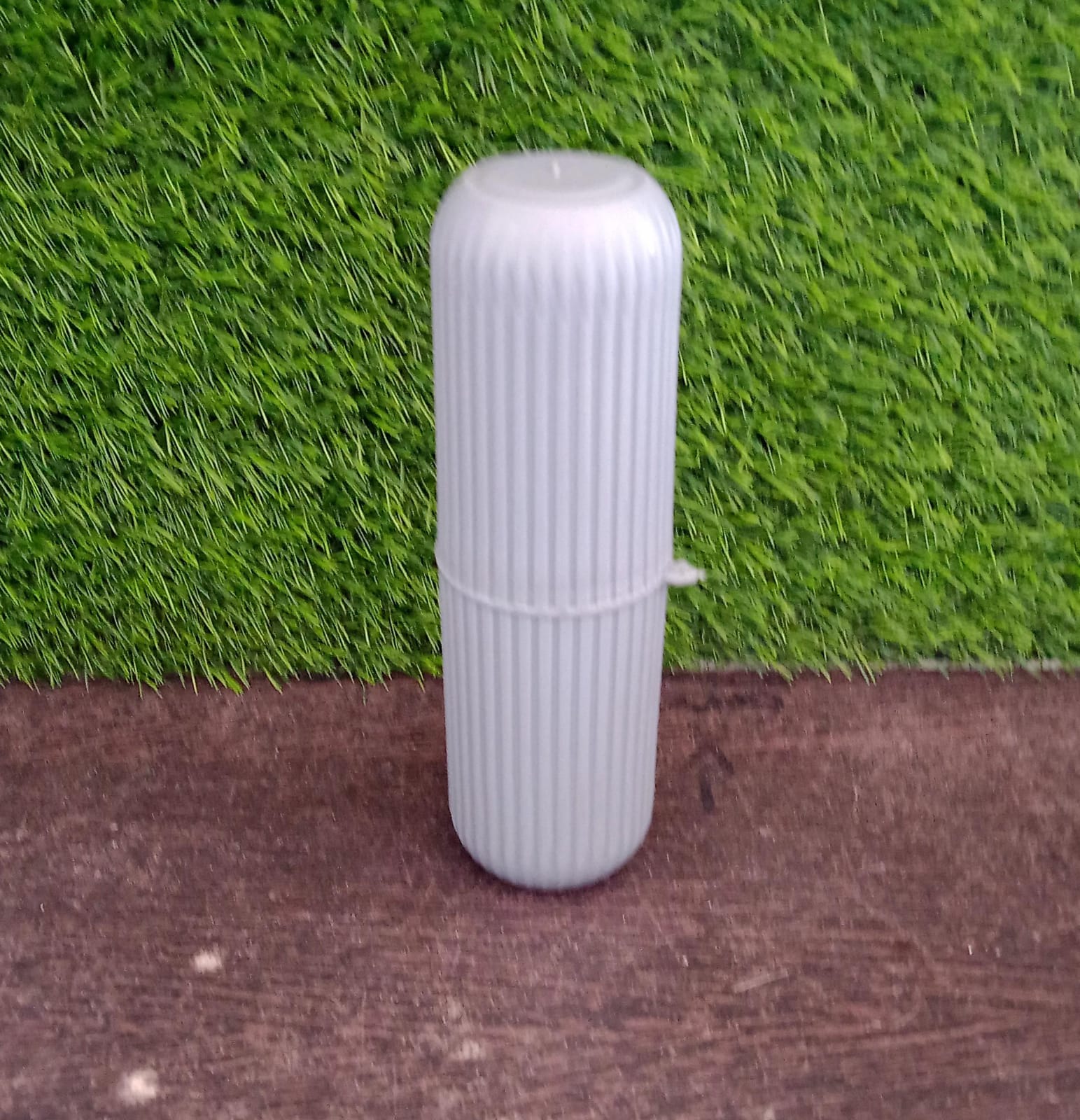 Travel storage bottle, capsule shape, with detailed texture